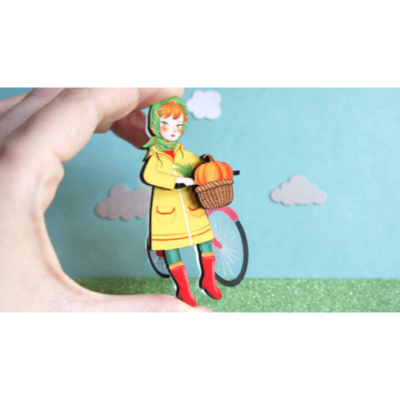 Girl with bicycle brooch by Laliblue